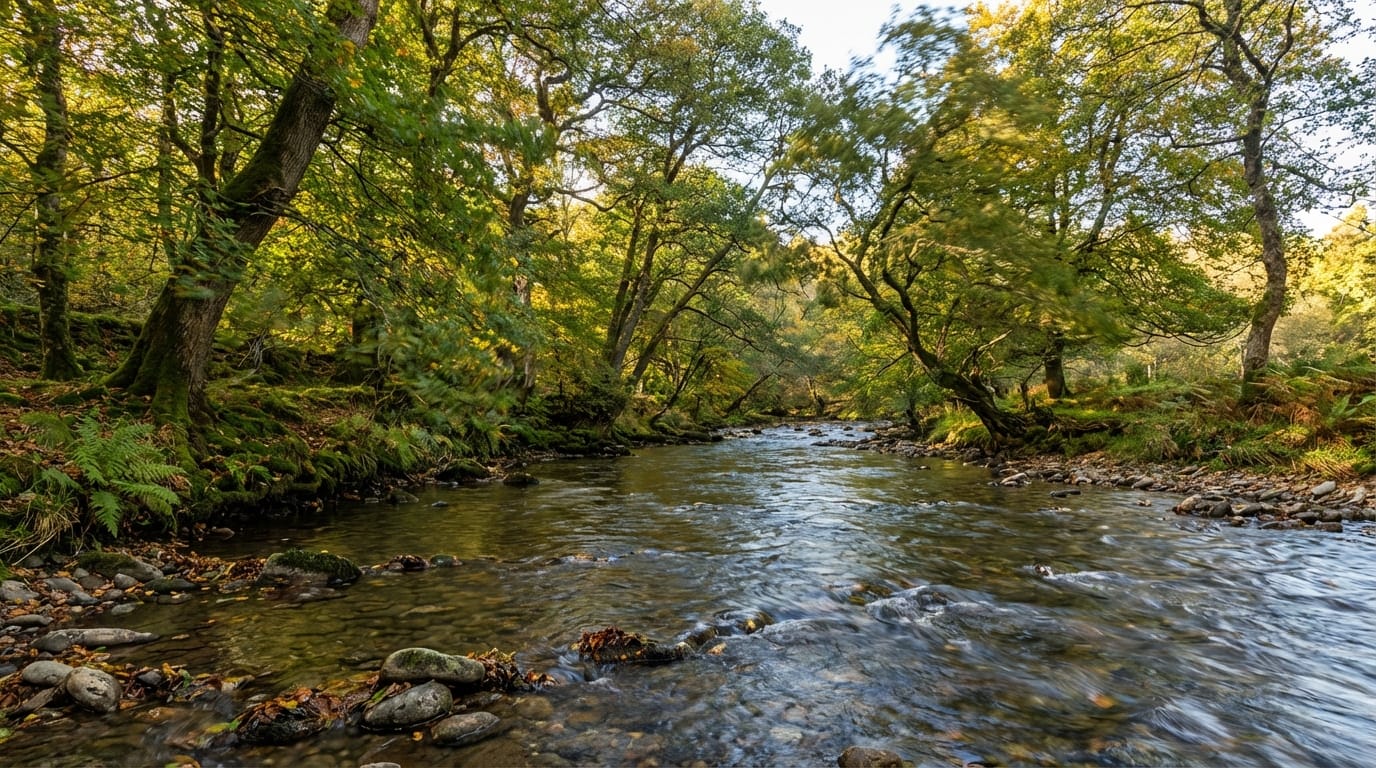 The water in the river flows gently, the trees sway slightly in the wind, realistic motion.